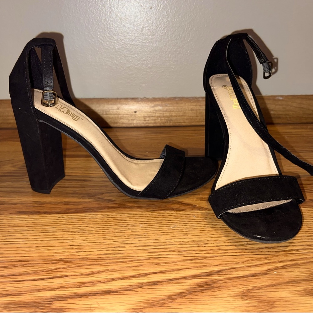 Black velvet heels with ankle strap, size 8.5W.